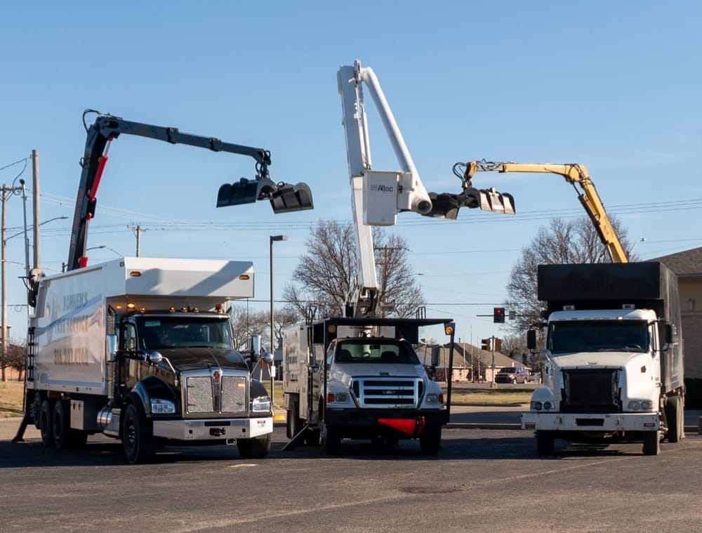 Kohnen's Tree Service fleet of grapple trucks ready for tree debris removal in Wichita Kansas